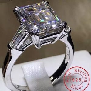 5.62-9.52Ct Three Stone Emerald Asscher White Sapphire